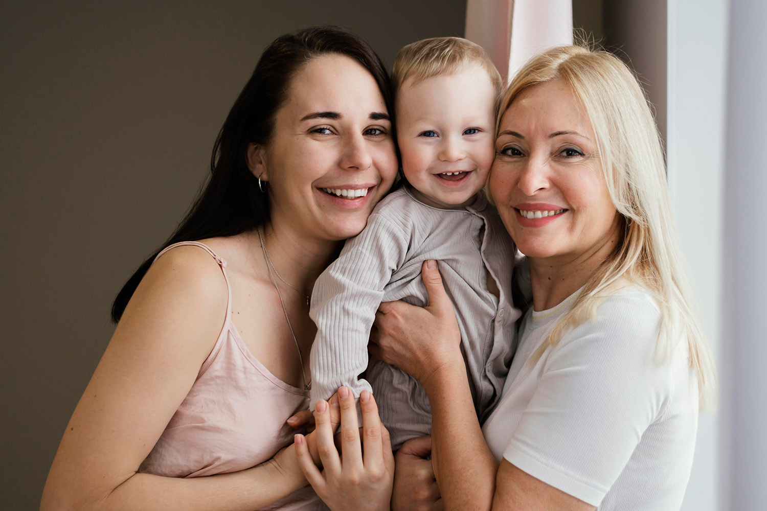 portrait-smiley-grandmother-with-mother-child